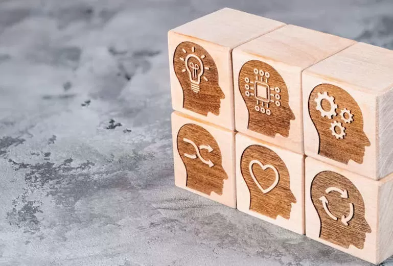 Wooden blocks with different skills icon carved into